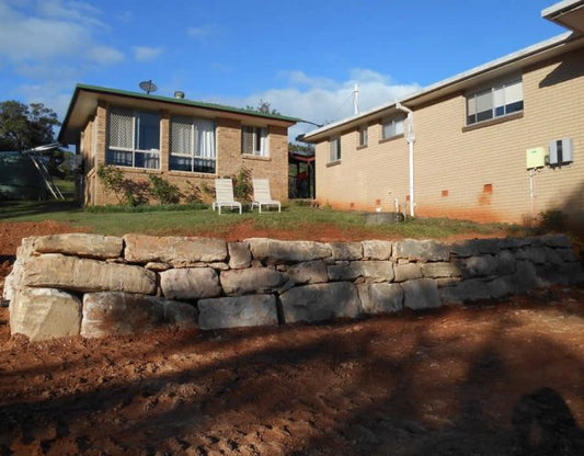 Random Sandstone Boulder Retaining Wall in Tallebudgera Valley