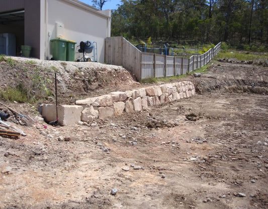 Random Sandstone Boulder Wall Installation in Gold Coast
