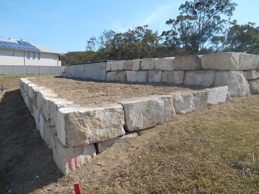 Sawn Sandstone Boulder Wall Installation in Gold Coast