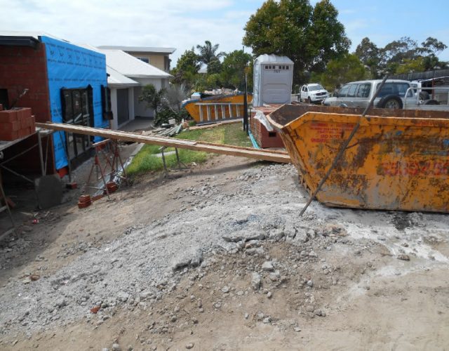 Heron Concrete Block Wall Installation for Coomera Property Enhancement
